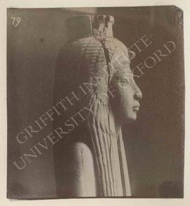 Head of a statuette of Ahmosi Nefertere in a cloak, dedicated by Wadjmosi, wood, from Deir el-Med...