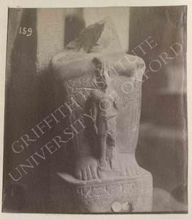 Squatting statue of Amenemopet with a figure of Amun in front, granodiorite, Dyn. XIX-XX, provena...
