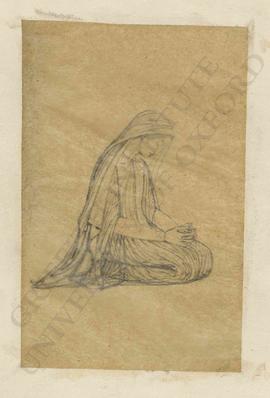 Woman kneeling with hands clasped in prayer