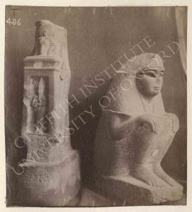 [Left] Standing statue (headless), holding naos with figure of Osiris, diorite, temp. Psammetikho...
