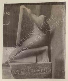 Headless statue of Neferhabef holding a stela dedicated to the ram of Amun-Re, red granite, New K...