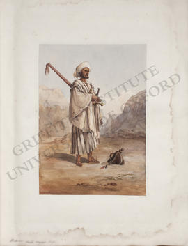 Egypt, portrait of a Bedouin sheikh with a gun and a sword