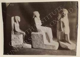 [Left] Seated statue of Amenmosi, Dyn. XIX-XX, provenance not known, now in Turin, Museo Egizio, ...