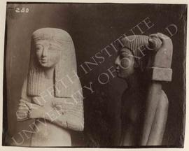 [Left] Statue of woman, wood, not identified, now in Turin, Museo Egizio; [right] statue of a man...