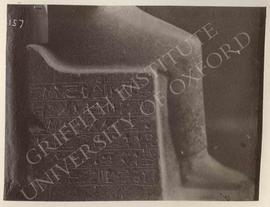 Headless statuette (in cloak) of Reni, grey granite, early Dyn. XVIII, from El-Kab, now in Turin,...