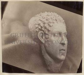 [87] Painted Roman head - 3 qrs.