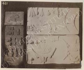 [Left] Trial-pieces, not identified, now in Turin, Museo Egizio; [right] cast, not identified, no...